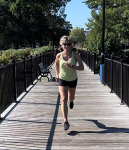 Polli running on bridge