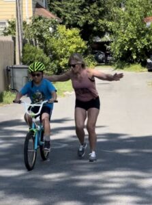 Polli and Mikey on bike