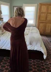 polli trying on brown dress 2