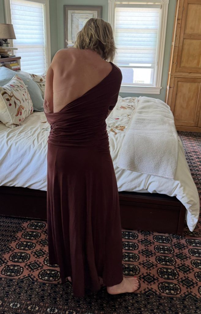 polli trying on brown dress
