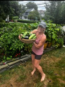 Polli with garden produce