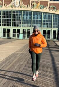 Polli-running-on-boardwalk-696x1024-1
